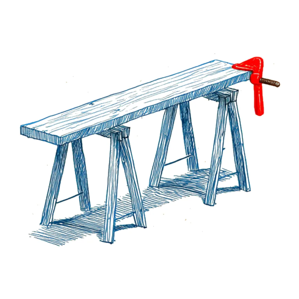 Two wooden sawhorses with a plank across them and one red F-clamp on the edge.